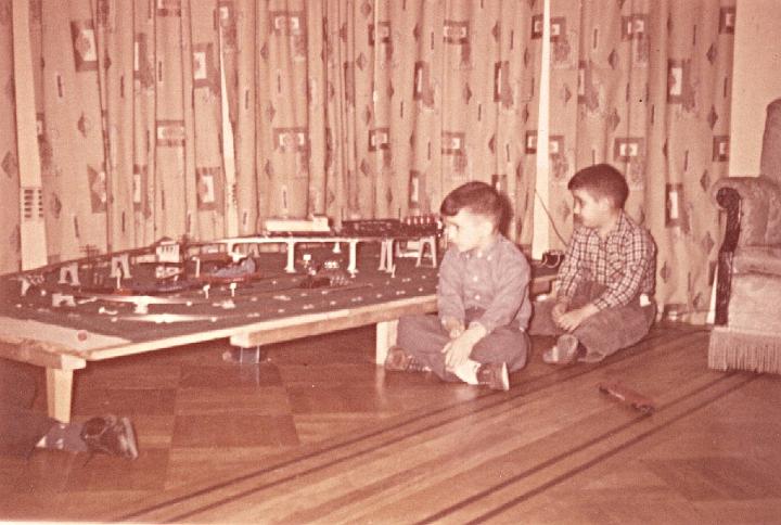 o05g.jpg - Enjoying our train set, 1963.