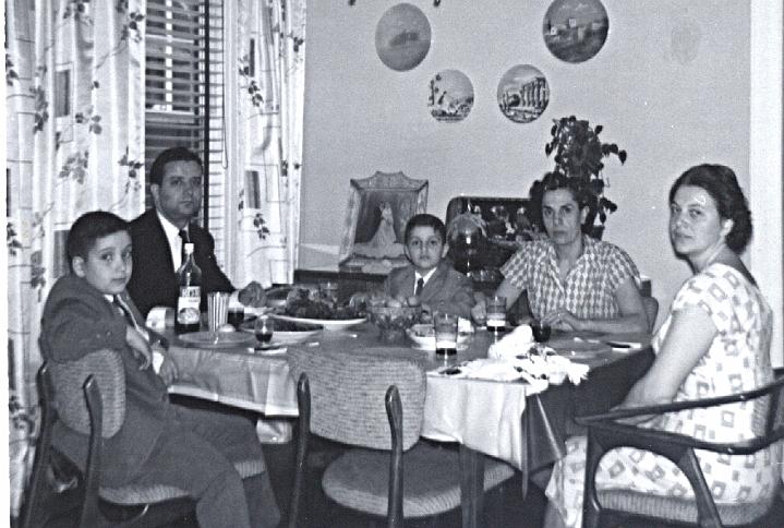 o06d.jpg - At the dinner table, May 1964.