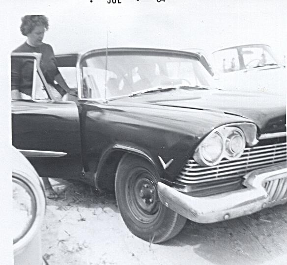 o09b.jpg - Mom entering our car at the beach, 1964