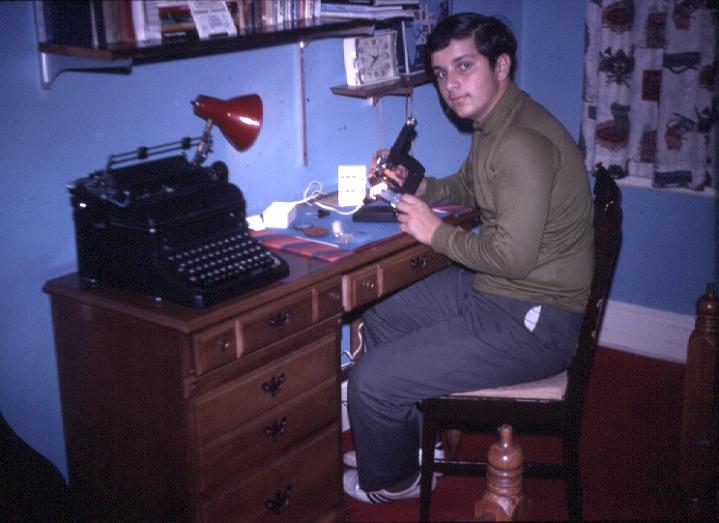 s012.jpg - Greg peering in his microscope, Nov 1970.