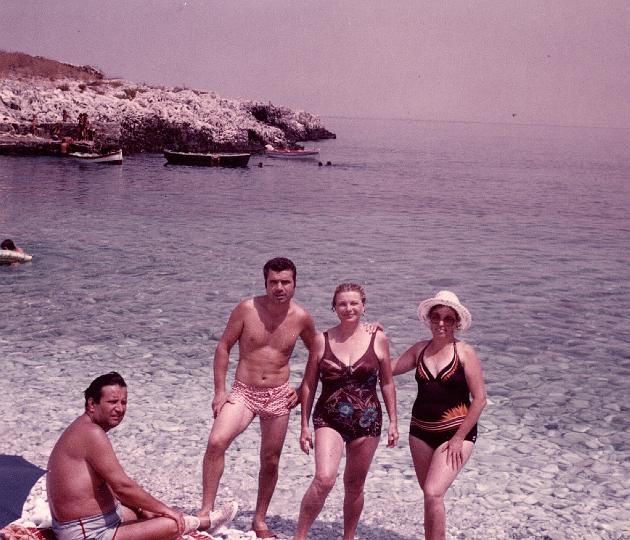 p132.jpg - Dad, theio Georgi, Mom, and theia Euaggelio at the beach, 1981.