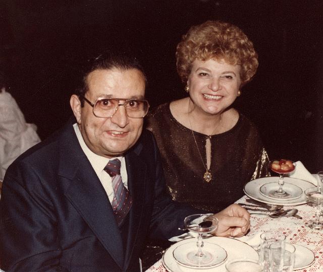 p146.jpg - Dad and Mom enjoying dinner, November 1982.