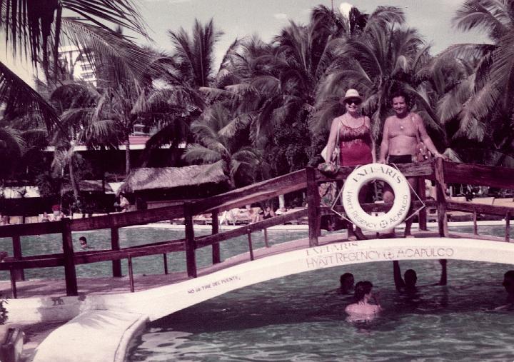 r050.jpg - Mom and Dad over the pool in Acapulco, Mexico, Oct. 1983.