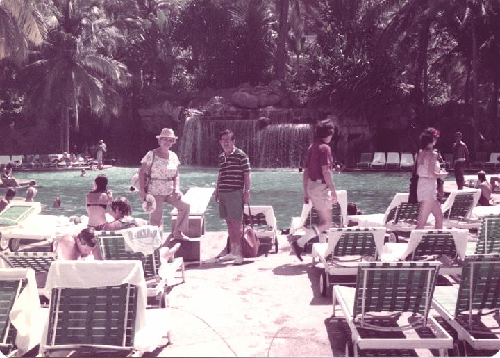 r058.jpg - Mom and Dad at the pool in Acapulco, Mexico, Oct. 1983.