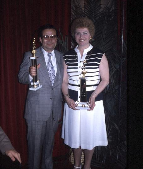 s021.jpg - Dad and Mom bowling champions, July 1980.