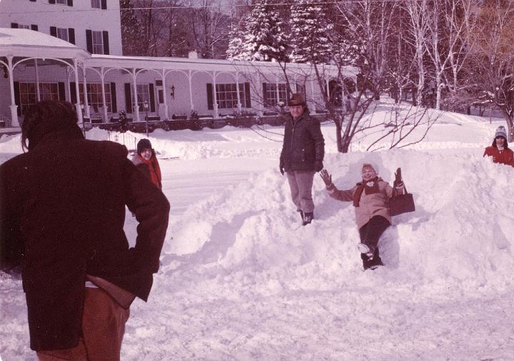 r016.jpg - Adults playing in the snow.