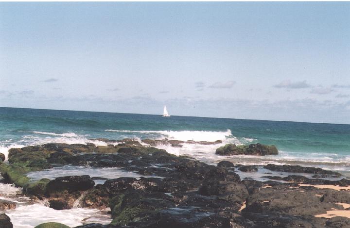 h004.jpg - An old lava tube extending into the ocean at Secret Beach, Kauai.