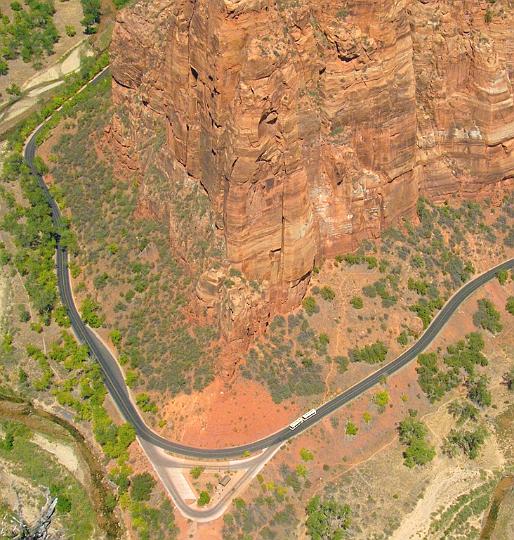 038a.jpg - View of a solitary bus on the winding road in the valley below. VF